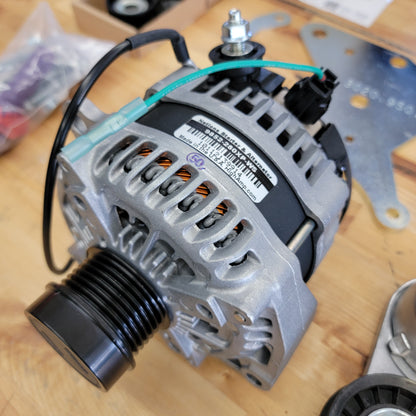 Close-up view of the dual alternator for Sprinter van, highlighting the alternator's build and connection details