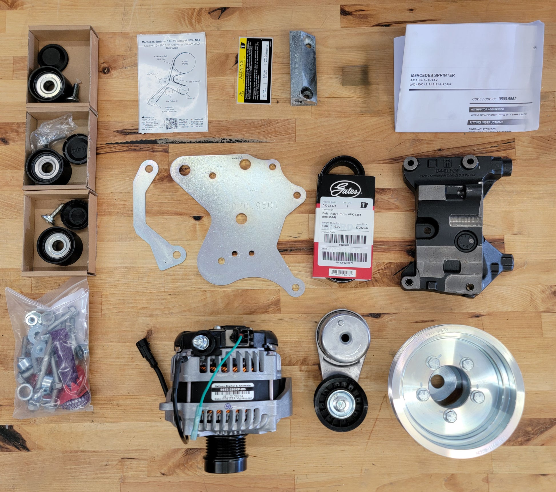 Components of the Sprinter Van Dual Alternator Kit including brackets, wiring, alternator, and detailed instructions